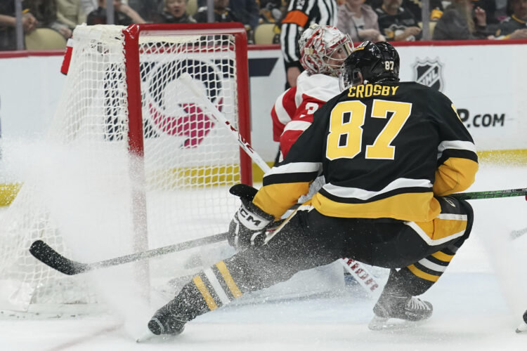 Pens blow lead, win in OT